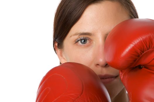 An image of a woman in gym clothes, with boxing gloves, strength and fitness