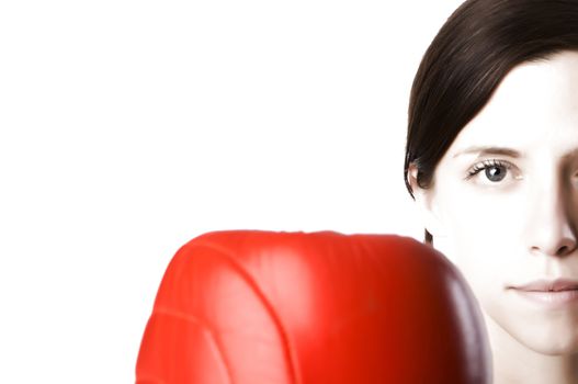 An image of a woman in gym clothes, with boxing gloves, strength and fitness