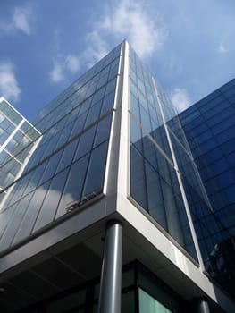 A view of a modern glass building in central London.