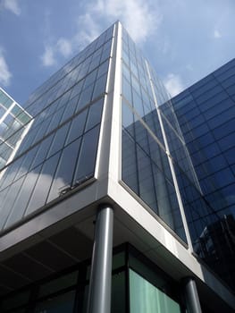 A view of a modern glass building in central London.
