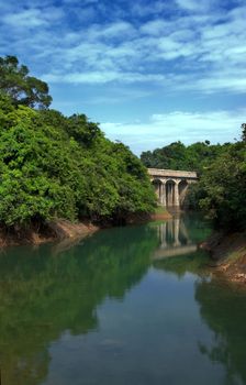 stone bridge on lake