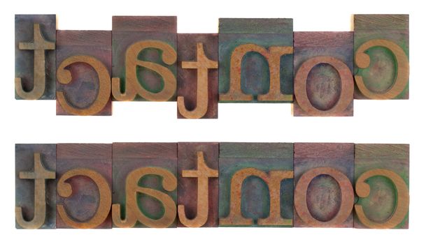 the word contact (two layouts) in old wooden letterpress type blocks, stained by colorful ink, isolated on white