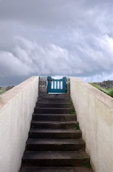 guarded steps with gate going upwards to the sky