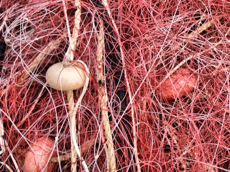 close-up image of a red fishing net