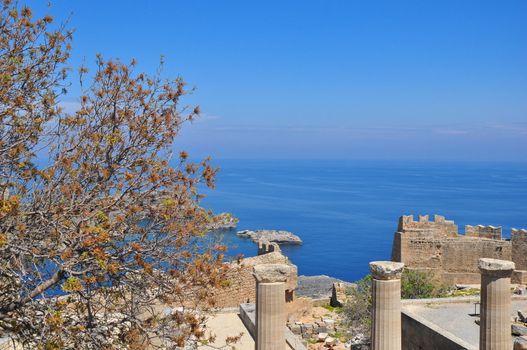 Lindos Acropolis - the second largest city of Rhodes - unfortunately, not very well preserved, but it is located on a cliff overlooking the magnificent views of the Gulf of St. Paul.