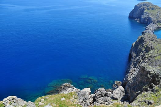 One of the most beautiful places . The beautiful sandy beach, crystal clear sea, blue sky, mountains.