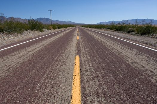 Old route 66 at daytime with green bush