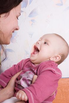 Mommy and daughter in the kid room