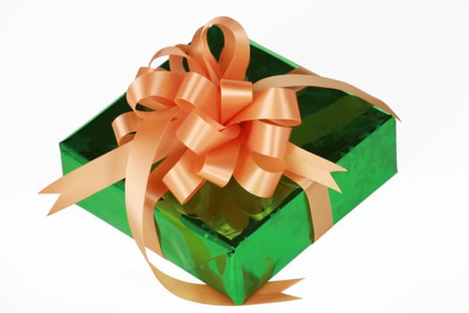 Green present with orange bow and ribbons