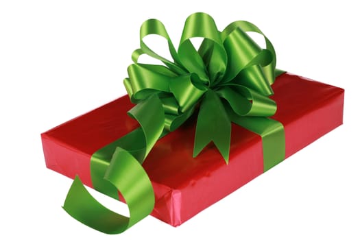 Red present with green ribbons and bow