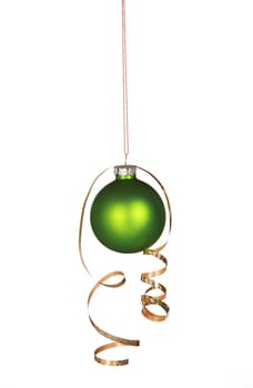 Beautiful green ornament hanging with curly ribbon