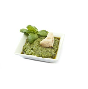 
basil sauce typical of Ligurian cuisine on white background