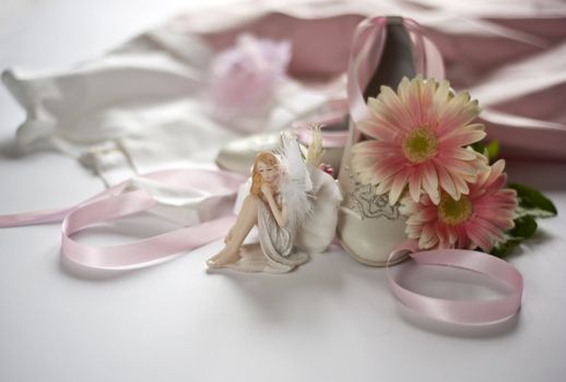 Favor and dress for first communion on white background