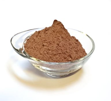 
a cup of chocolate cake on white background