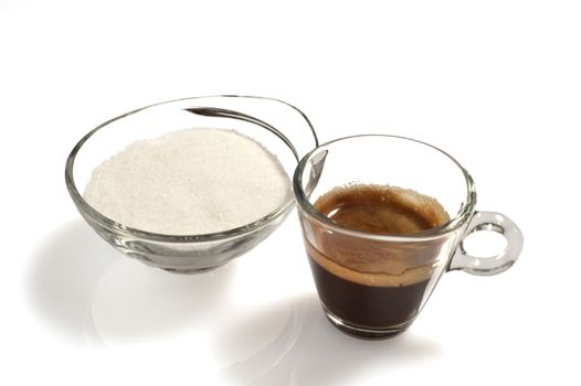 cup of coffee and sugar bowl on white background