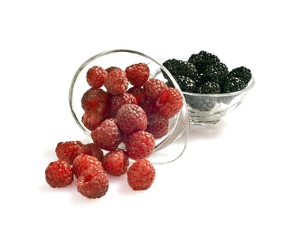 blackberries and raspberries on white background