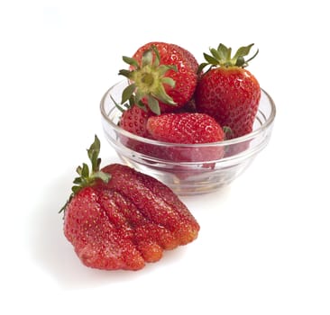 
Freshly picked strawberries on a white background