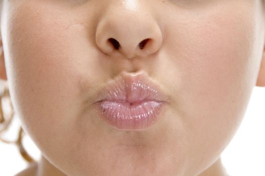 close view of lips of girl on an isolated background