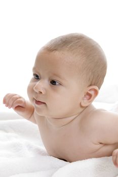 smiling baby lying with white background