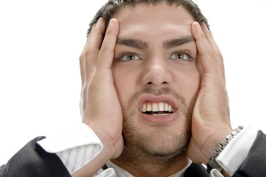 frustrated young businessman on an isolated background