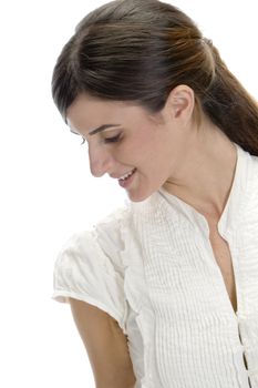 charming lady looking down with white background