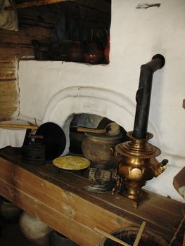 Kitchen utensils in ancient russian stove in Novgorod Russia