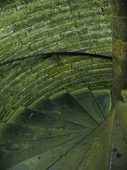 Old spiral spin stair in moon lighting