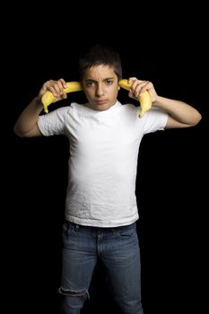 teenage boy cannot hear you because of bananas in his ears