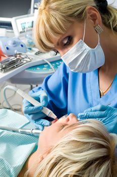 dentistry, doctor and patient, drilling the tooth