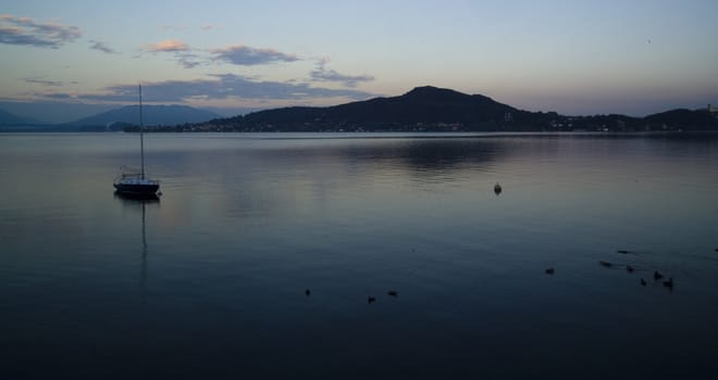 very calm sunrise at lake's beach