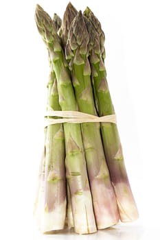 a bundle of green asparagus on white background