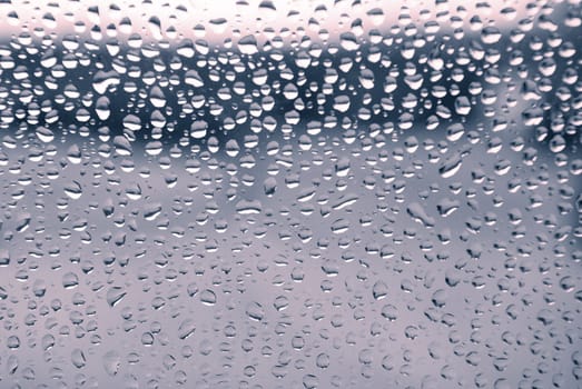 rain drops on glass textured background,Close-up