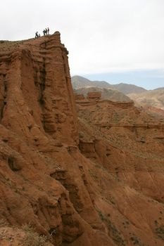 Travel in mountains of Kyrgyzstan. A red canyon.