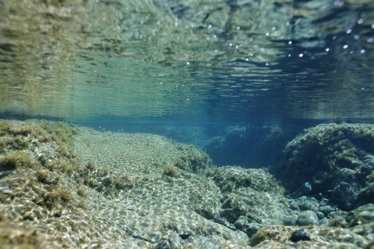 Underwater rocks in ocean in Maui, Hawaii.