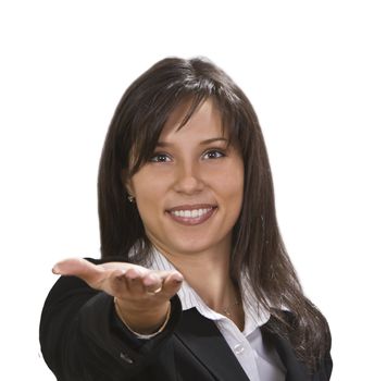 Smiling brunette offering something on her hand.Selective focus on the face.