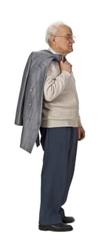 Senior man with a coat over his shoulder standing-up against a white background,profile.