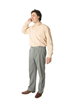 Standing man with a cellphone, over white