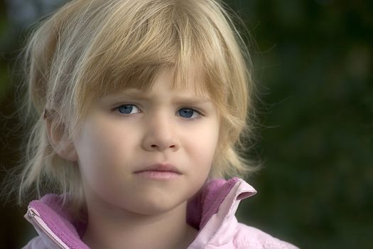 Portrait of girls in the open air on the blur background