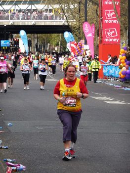 LONDON - APRIL 25: Runners at the 2010 London Marathon April 25th, 2010 in London, England 