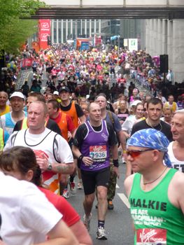 LONDON - APRIL 25: Runners at the 2010 London Marathon April 25th, 2010 in London, England 