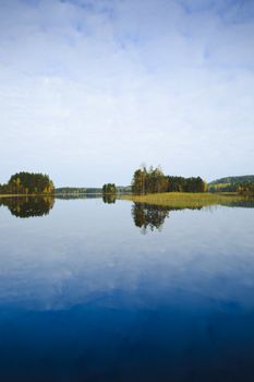 Sunrise at the lake in eastern part of Finland