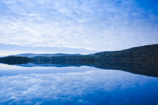 lake and forest at sunrise in Finland