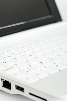 Close up of white mini laptop computer