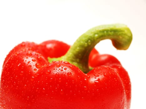 Red pepper vegetable, top, closeup towards white background