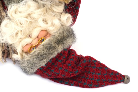 Portrait of Santa up side down on a white background.