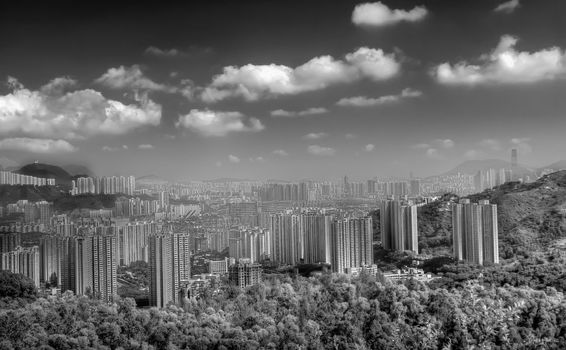 Beautiful cityscape of building near mountain in Hong Kong.