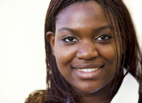 Closeup of a pretty African American woman with braids