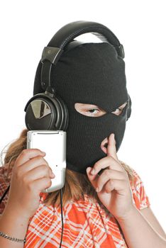 Closeup view of a young girl wearing a ski mask, listening to illegal music, isolated against a white background.