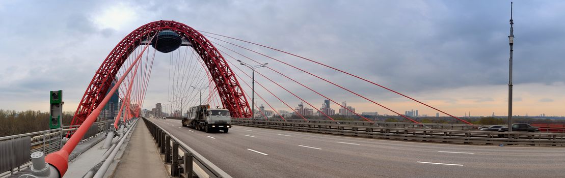 Modern red moscow car bridge, panorama evening sundown