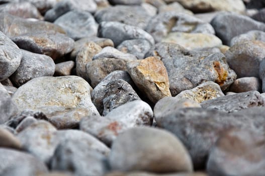 fine background with closeup pebble stones at the daylight